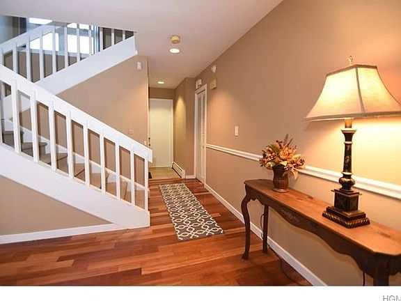 Enter into this lovely home into lower level with Brazilian wood flooring.