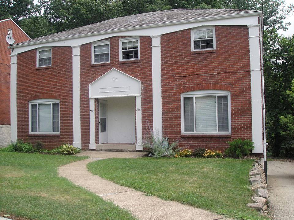 Driveway on right with additional parking and integral garag