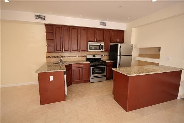 1st image of 1554 E 59th St