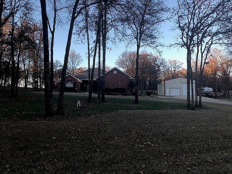 Beautifully landscaped acre