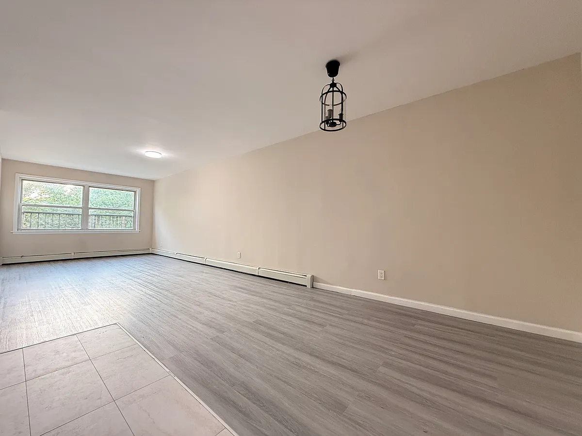 Building Photo - 30-15 70th St #3