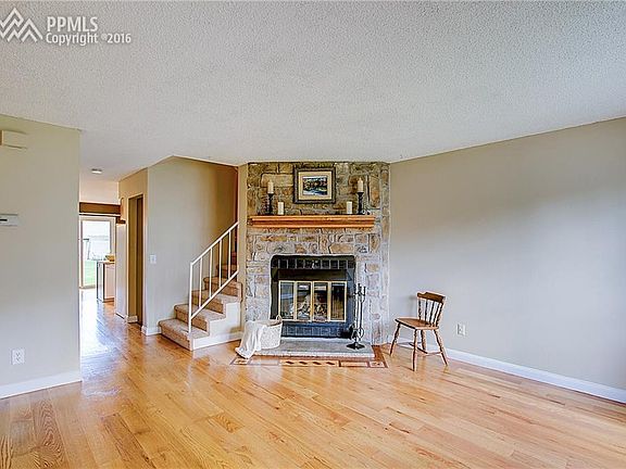 Bright living room with oak hardwood floors.