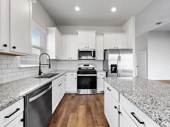 The kitchen has a convenient kitchen island.