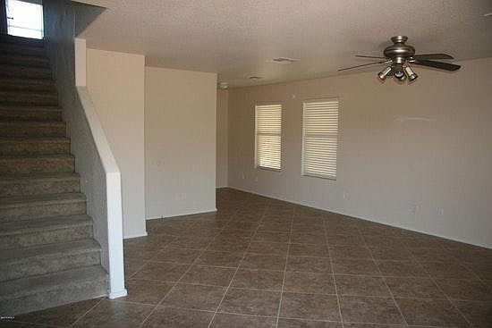 Large, open main floor leads to staircase to bedrooms upstai