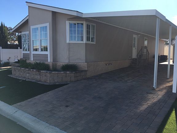 Attached aluminum carport