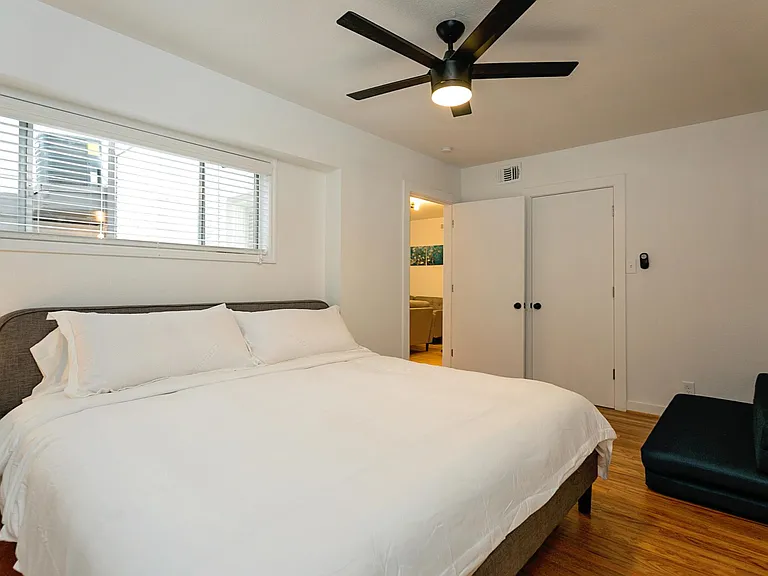 Master with a king size bed, and guest bedding