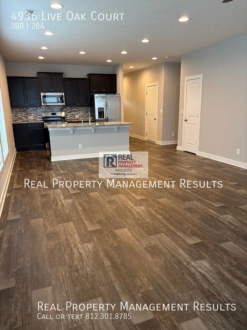 Open Floor Plan Newburgh Home with Back Deck — Photo 3