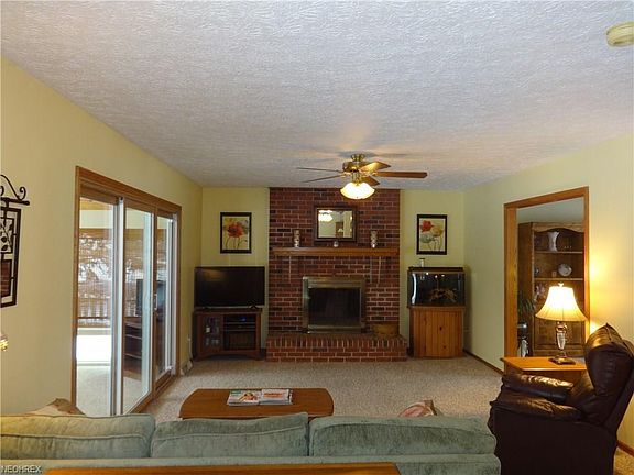 Family room with slider to 3 season room