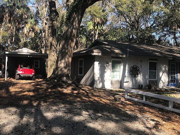 driveway on left to carport