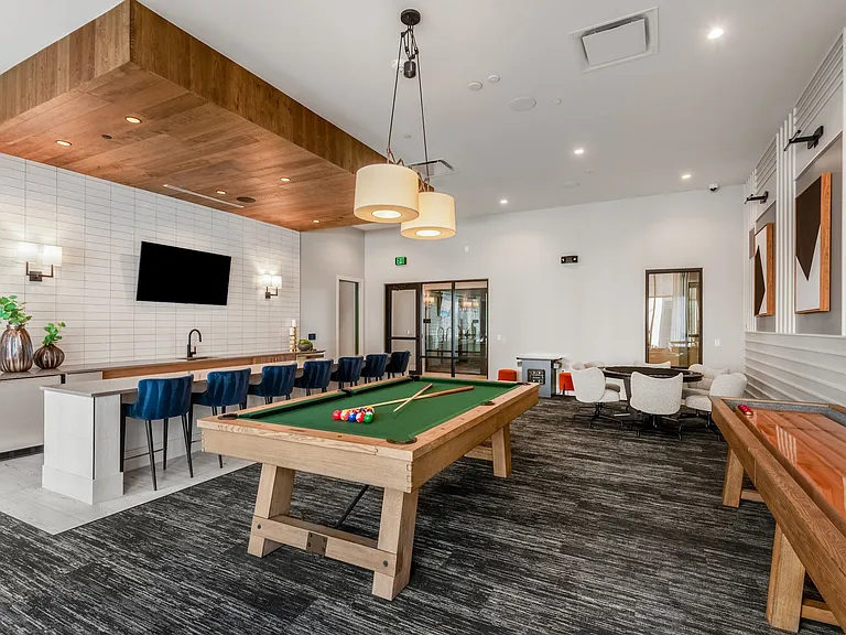 Resident Recreation Lounge with Multiple Game Tables and Ample Space