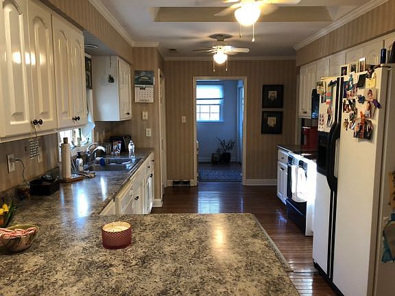 Kitchen into laundry room 
