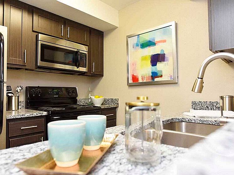 Explore this chic kitchen, perfect for culinary creativity and stylish living.