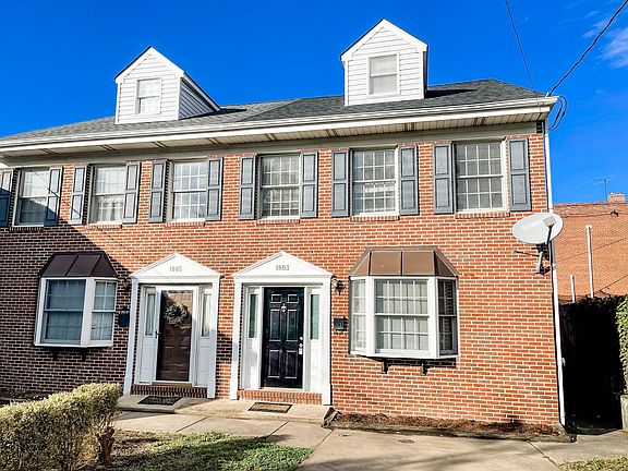 Stately brick twin