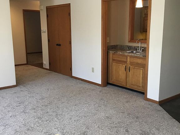 Bar nook off living room and large closet.