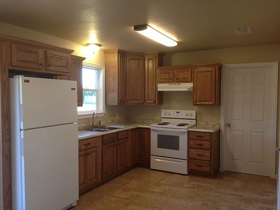 Kitchen (behind range/wall is large Utility Room with W/D ho