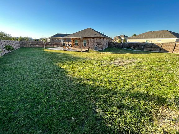 Oversized back yard, lots of room to play!