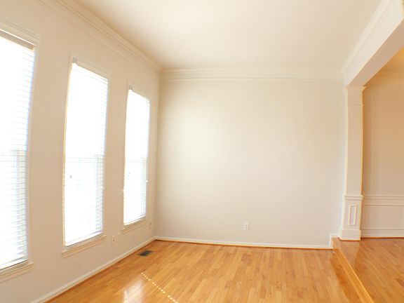 Living room steps up to dining room