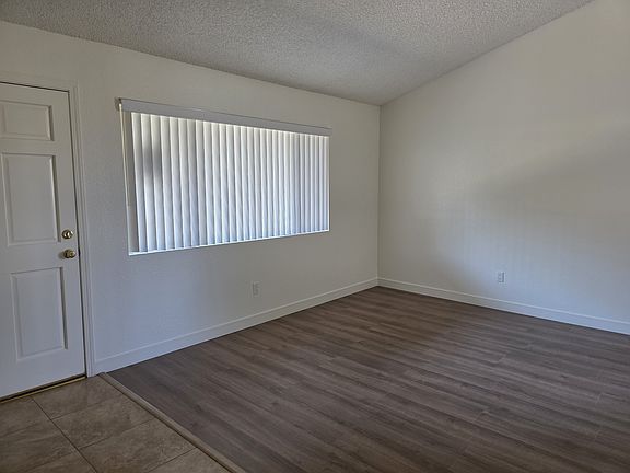 Living Room with Vaulted Ceilings and New Wood Flooring