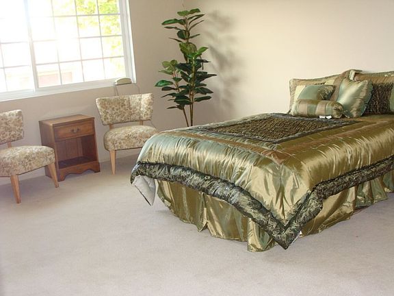 Master bedroom has room for sitting area