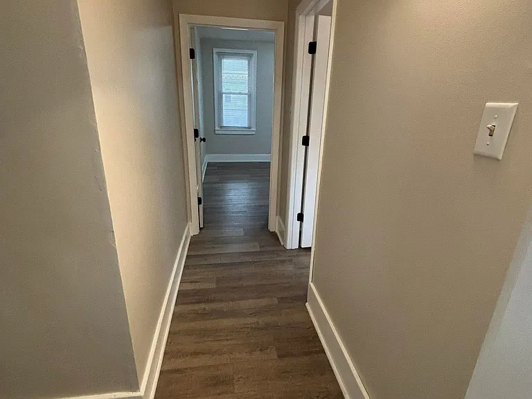 Hallway to other two bedrooms