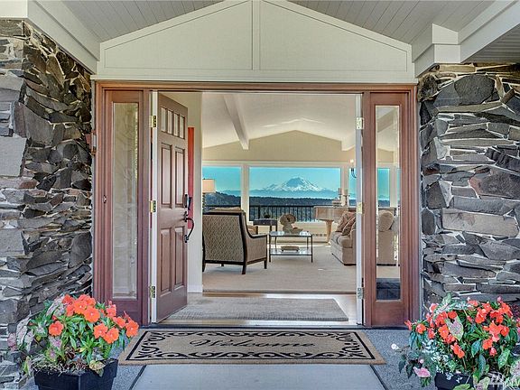 Mt.Rainier greets you as you enter the front doors! Basalt rock frames doors.