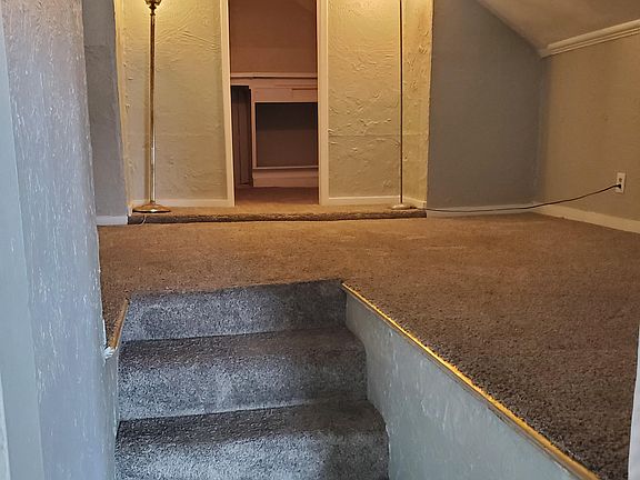 Bedroom 2 looking into its closet.