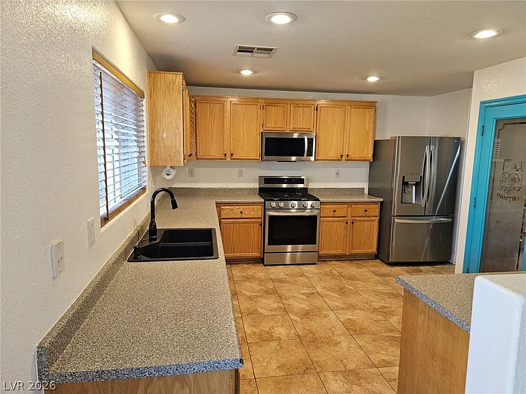5064 Whistling Acres Ave — Photo 21