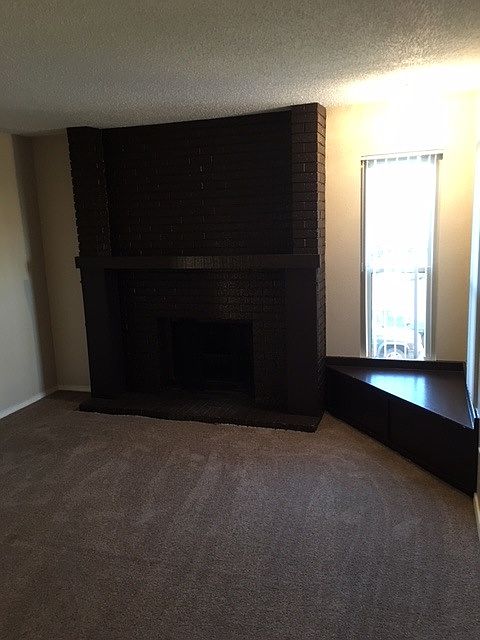 Living Room with fire place and reading nook