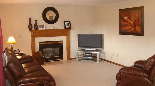 Gas Fireplace/Oak Mantle