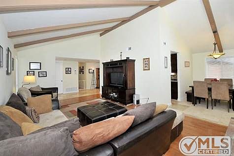 Formal Living Room looking towards Entrance....to the right is a peek a boo view of the Formal Dinin