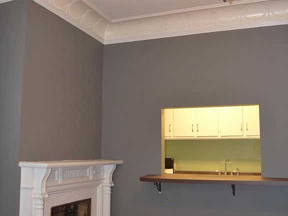 View of the decorative fireplace and breakfast bar