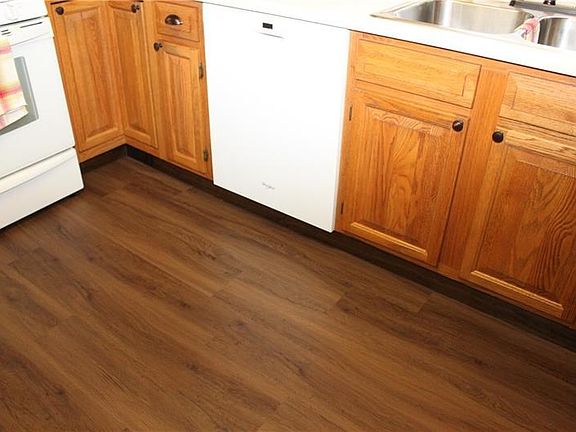 updated kitchen with brand new flooring