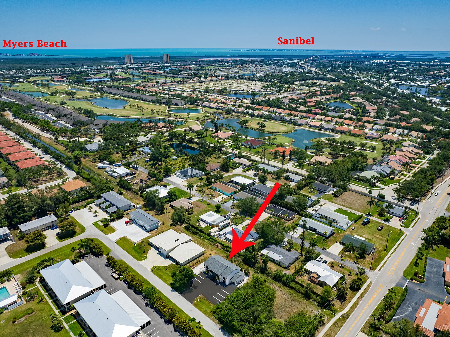 Aerial of location mins. Fort Myers Beaches & Sanibel. Shopping, Restaurants, Margaritaville Resort.