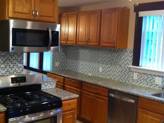 Kitchen, Stainless appliances, granite counters, tons of cabinets.