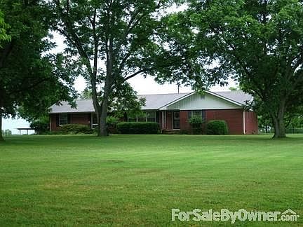 Front Side
						:
						Front yard with mature pecan trees with Kenton's famous white squirrels.