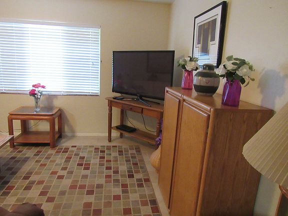 A large cabinet provides additional storage space.