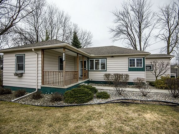 This home was built in 1968, situated on a half acre lot with a private back yard in Portsmouth Town