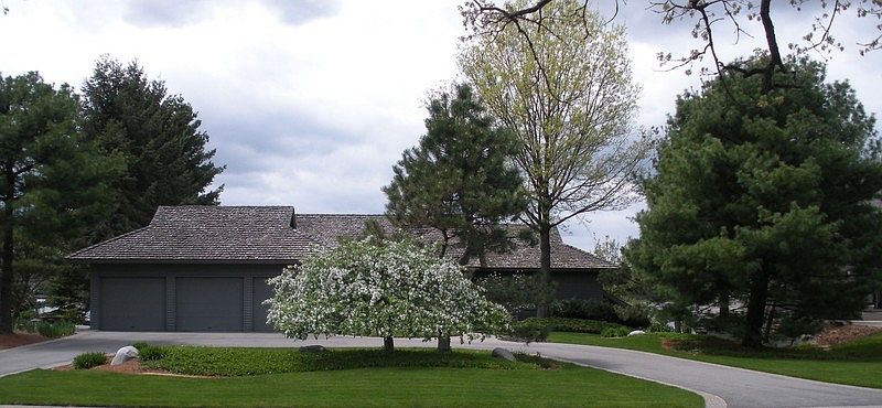 Front Elevation
						:
						Circle asphalt drive with aggregate border