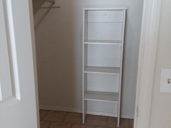 Walk in bedroom closet