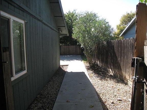 Side yard (has a gate) to backyard