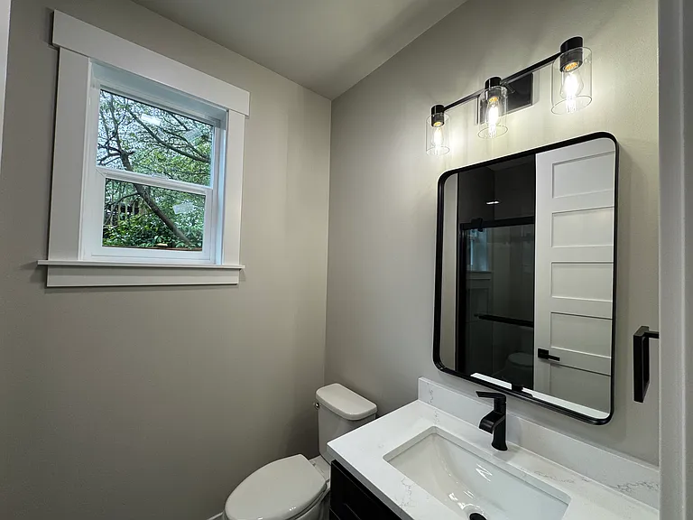 Downstairs bathroom next to guest bestroom