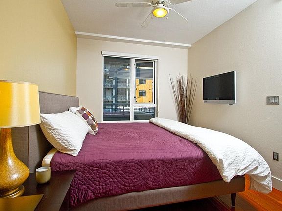 1st bedroom easily fits king bed and dresser and has walk in closet