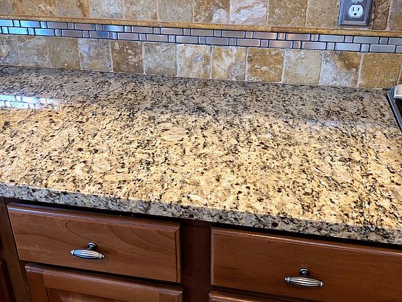 cherry cabinets
granite