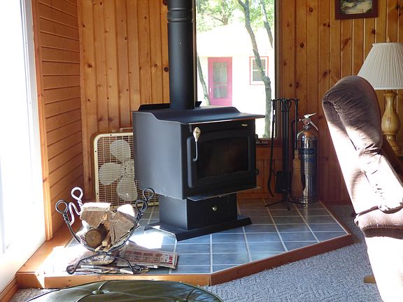Glass front wood stove