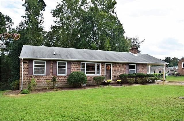 Brick Rancher Ready to Move Into, Carport and a Detached Garage!  Freshly Painted, Hardwood Floors, Updated Kitchen!