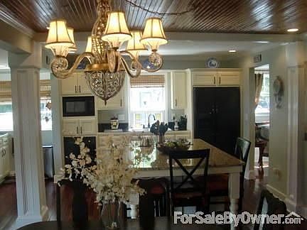 Elegant by Design : Huge kitchen that can set the mood for any dinner party.