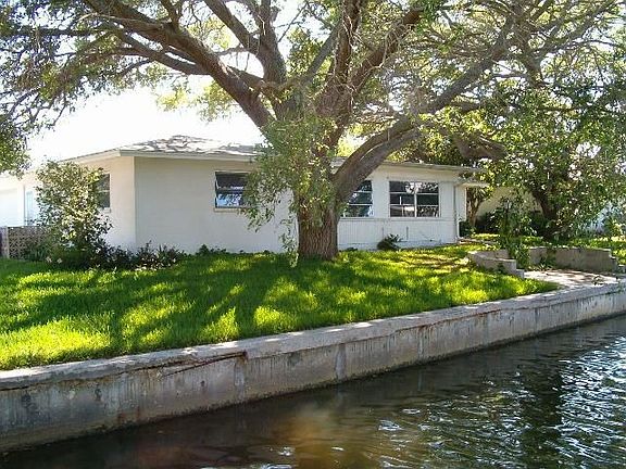 Back of home with seawall