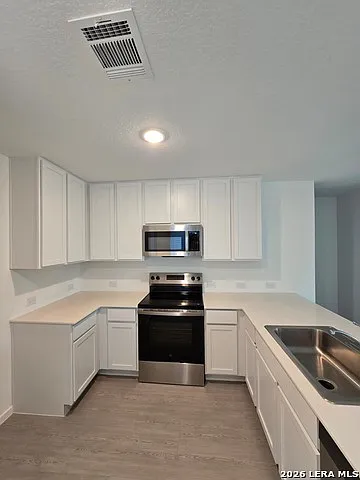 4 bed, 2.5 bath, 1692 sqft, $1,690 — Photo 2