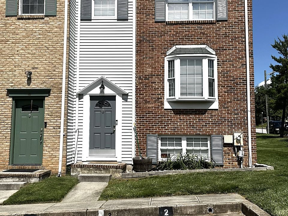 Front of the Unit with 2 dedicated parking spots (Both labeled #2). Also plenty of street parking available.