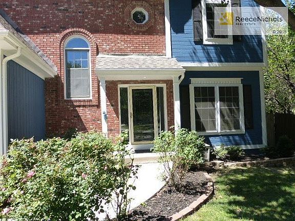 Nice landscaping and underground sprinkler.